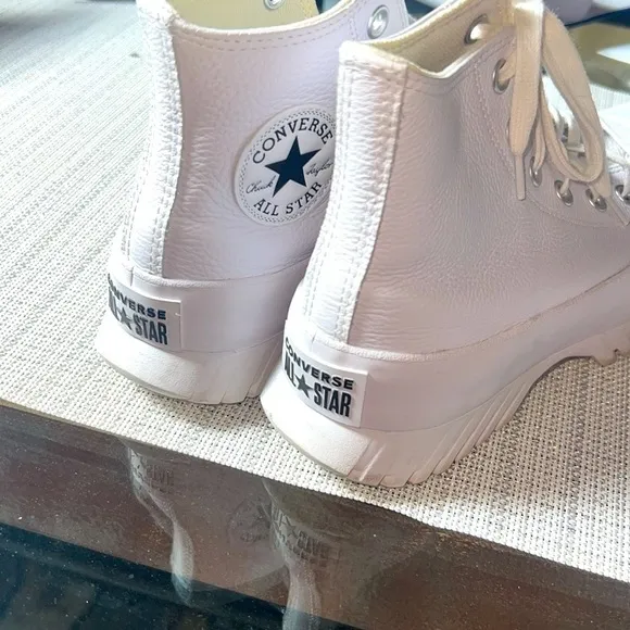 Converse all Star Chuck Taylor white leather high top platform women’s/ men’s