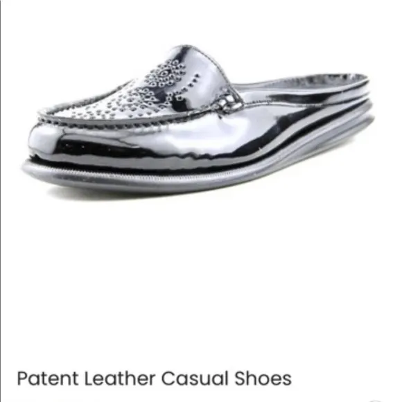 Eric Michael black patent leather perforated slip on mules in size 41