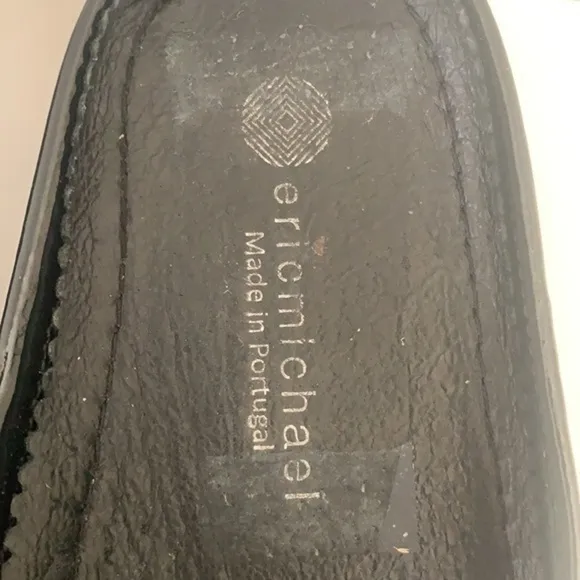 Eric Michael black patent leather perforated slip on mules in size 41