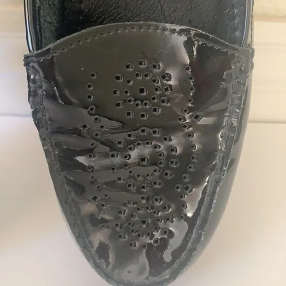 Eric Michael black patent leather perforated slip on mules in size 41