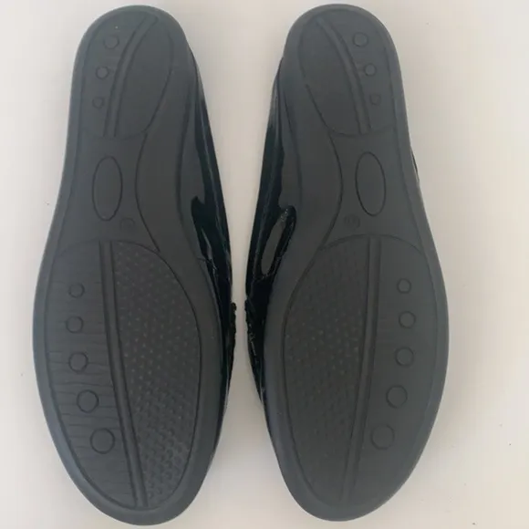 Eric Michael black patent leather perforated slip on mules in size 41