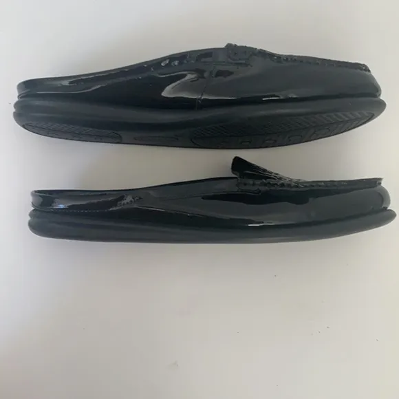 Eric Michael black patent leather perforated slip on mules in size 41