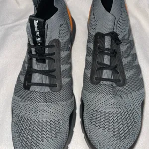 Gray and Black Athletic Shoes