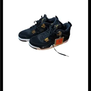 Jordan Black and Gold High-Top Sneakers