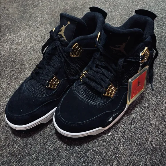 Jordan Black and Gold High-Top Sneakers