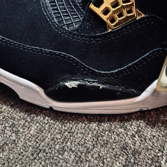 Jordan Black and Gold High-Top Sneakers