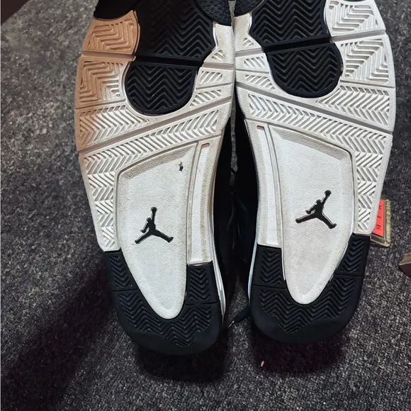 Jordan Black and Gold High-Top Sneakers