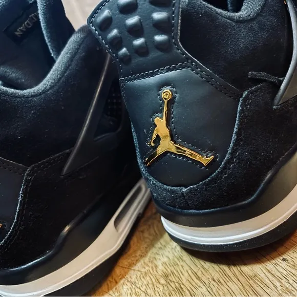 Jordan Black and Gold High-Top Sneakers