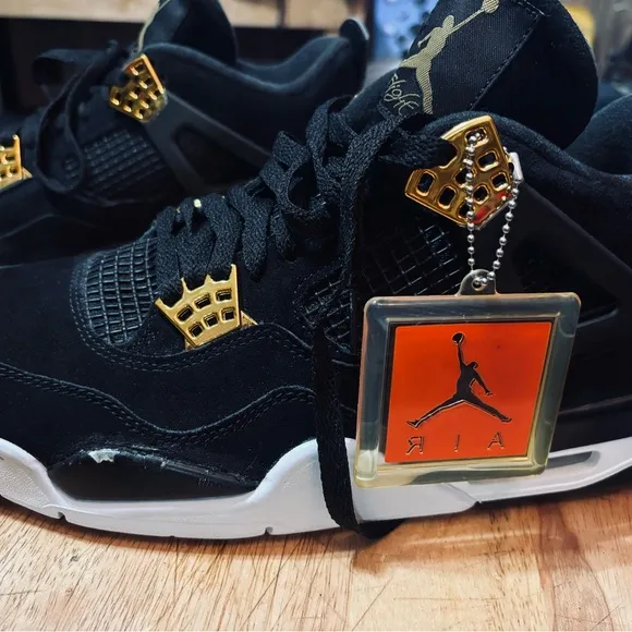 Jordan Black and Gold High-Top Sneakers