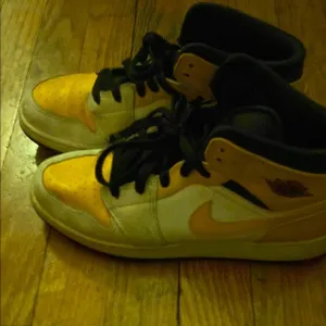 Jordan Black and Orange Sneakers High-Top Style