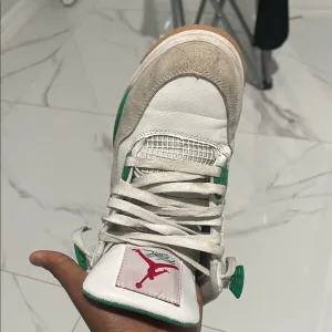 Nike Athletic Shoes - White, Green, and Red