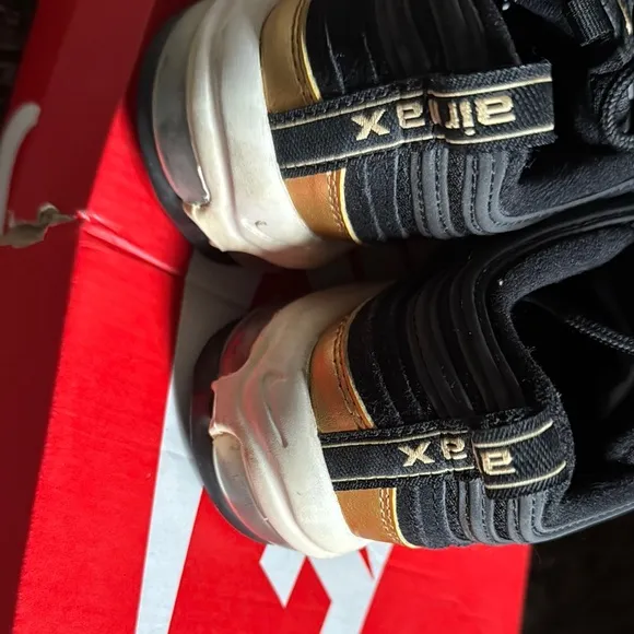 Nike Black and Gold Sleek Sneakers