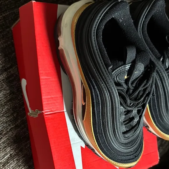 Nike Black and Gold Sleek Sneakers