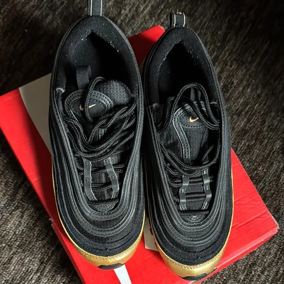 Nike Black and Gold Sleek Sneakers