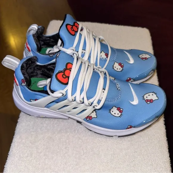 Nike Blue and White High-Top Athletic Shoes