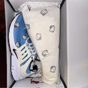Nike Blue and White High-Top Athletic Shoes